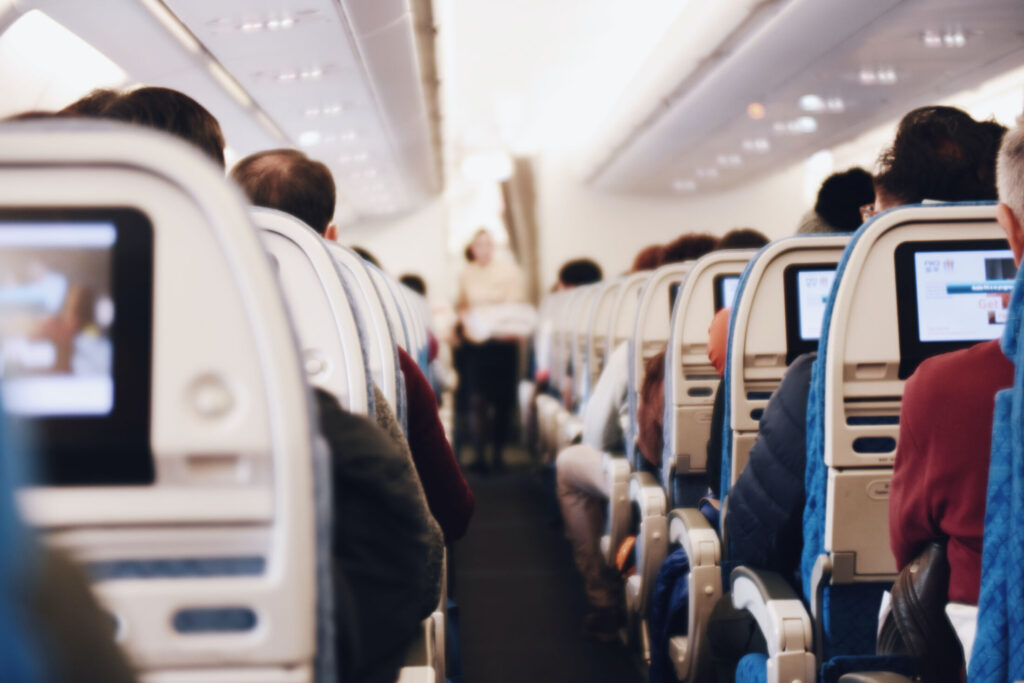 Looking down the aisle of a full aircraft