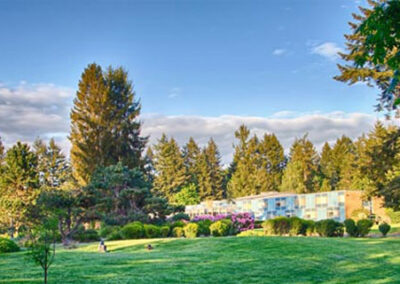 A view of the building and grounds at dumas bay retreat center.