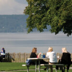 A view of a lunch tables and puget sound from dumas bay retreat center.