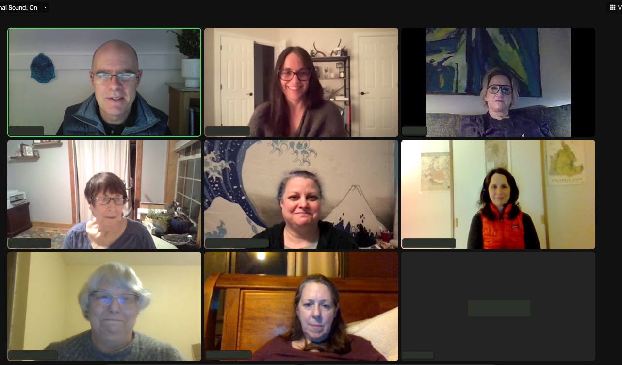 a screenshot of zoom class participants smiling in online mindfulness class