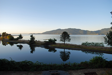 The view from the dining hall at Samish Island Mindfulness Retreat Center; Samish bay and a tidal lagoon on a clear day.