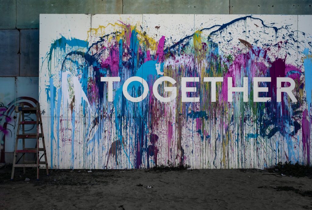 Word 'Together' on splash paint